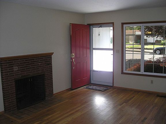 Living Room w/Wood Fireplace