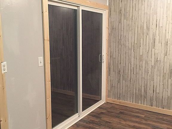 Kitchen w door going to deck