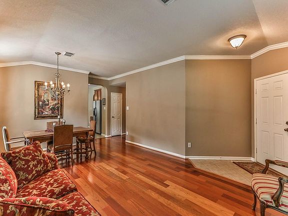 This home features beautiful hardwood laminate flooring in the formal living and formal dining room.