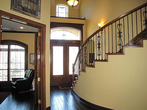 Detailed craftsmanship with 5" wide plank wood floors extending throughout most of downstairs includ