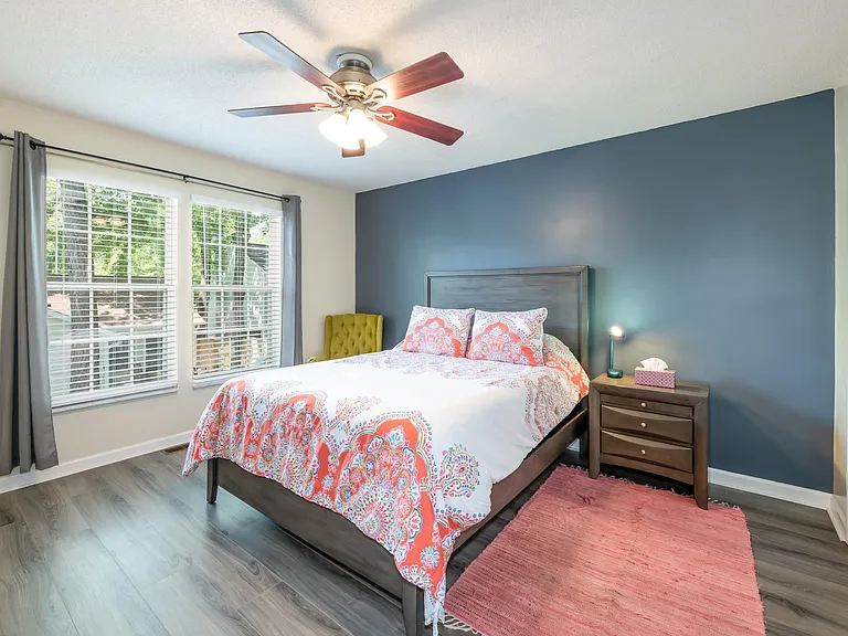 Master bedroom with queen bed and full ensuite bathroom