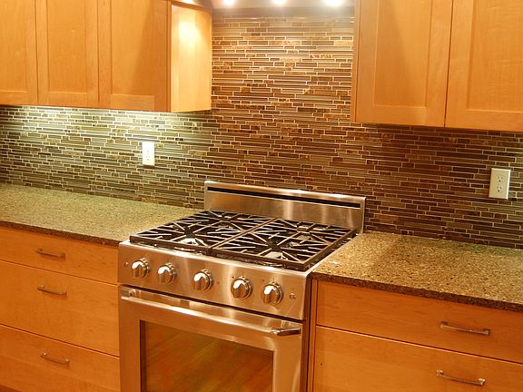 Dacor Gas Range with Faber Vent. Large Cabinet Drawers for Easy Storage.