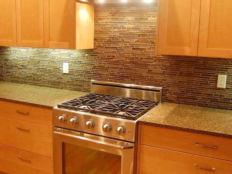 Dacor Gas Range with Faber Vent. Large Cabinet Drawers for Easy Storage.