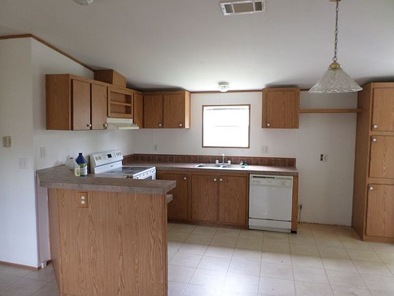 5th image of 220 NE 12th Ave Lot 74