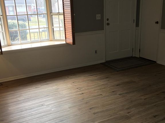 Living room with front picture window