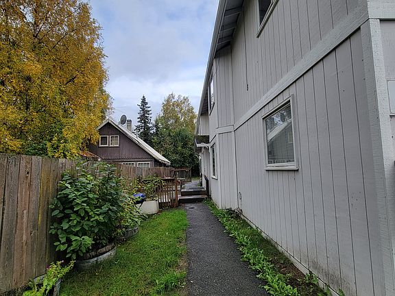 Locked front door, shared deck and picnic table