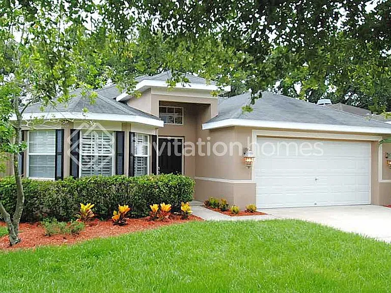 4704 Whispering Wind Ave — Photo 1