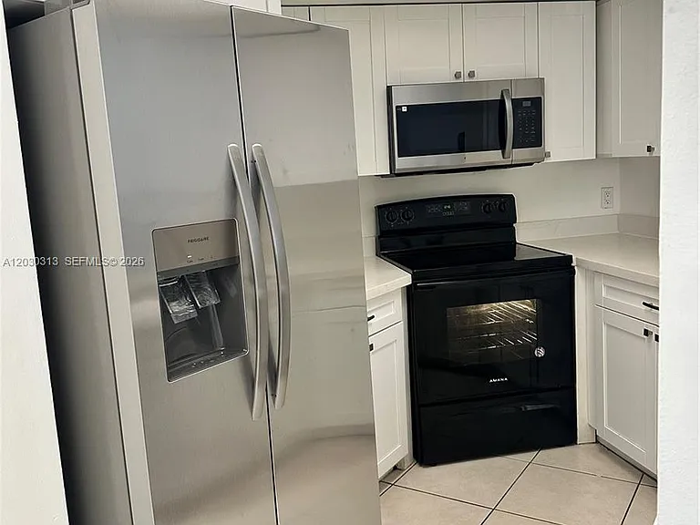 9607 SW 138th Ave #TC2R — Photo 2
