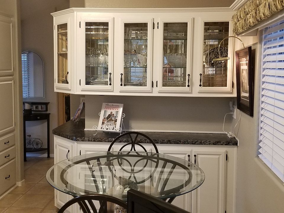 White cabinet black surface 