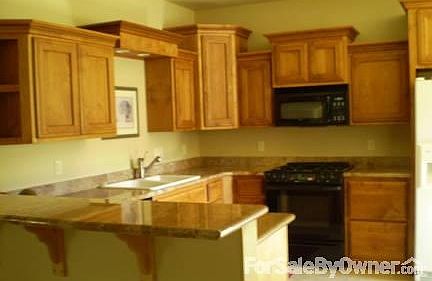 A Cook's Delight
						:
						Granite counter tops, custom cabinets, upgraded appliances, stone tile, pantry.