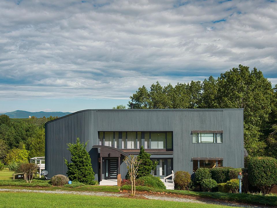 Front of the House with Foothills of the Smokey Mountains in the Background