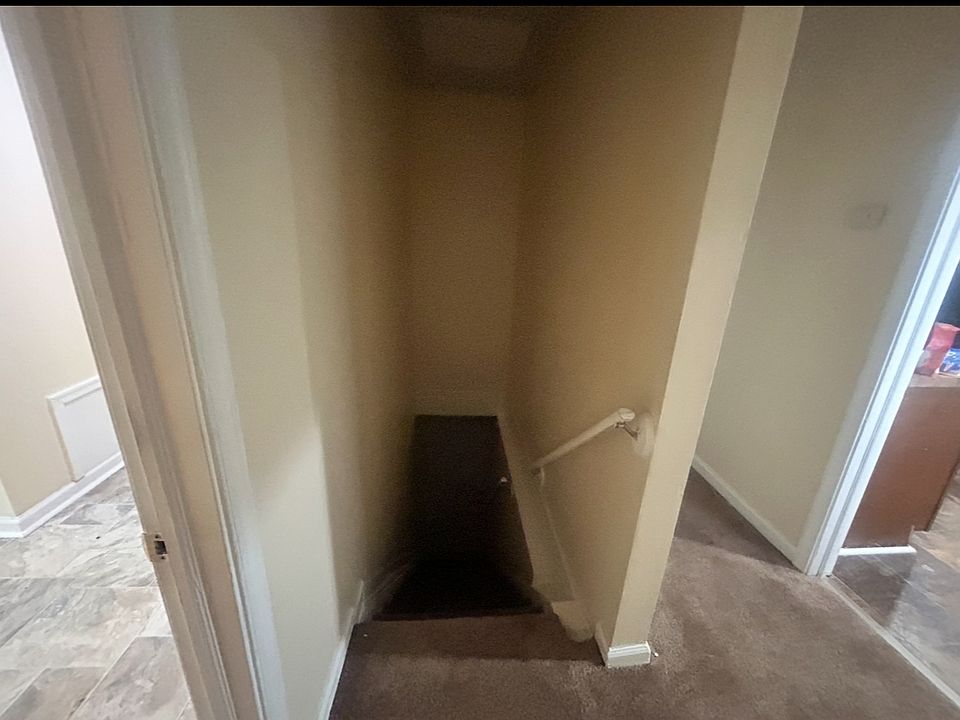 Stairs between unit front door and living area