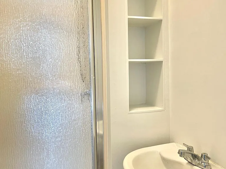 Bathroom connected to main bedroom.
