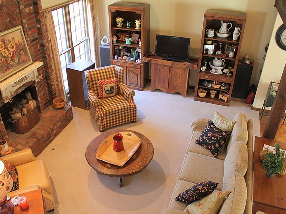 Warm Family Room with brick Fireplace