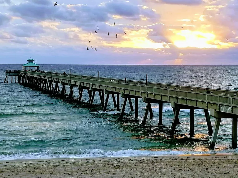 Enjoy peaceful walks along the iconic Deerfield Beach Pier and oceanfront promenade.