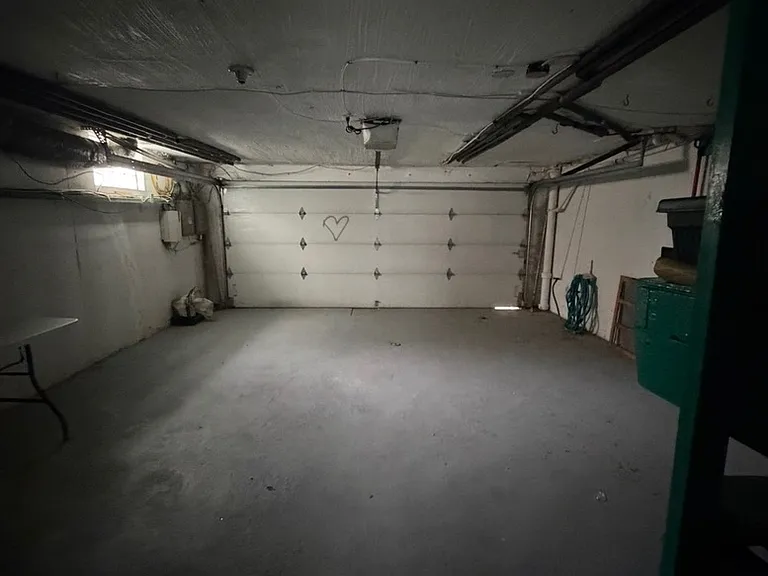 indoor garage 2 car space. or you can simply open the door and enjoy and 
INDOOR/OUTDOOR BBQ OR PARTY.