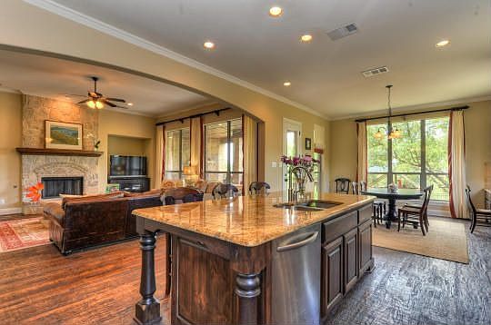 An open floor plan ensures that the cook won’t miss out on anything.