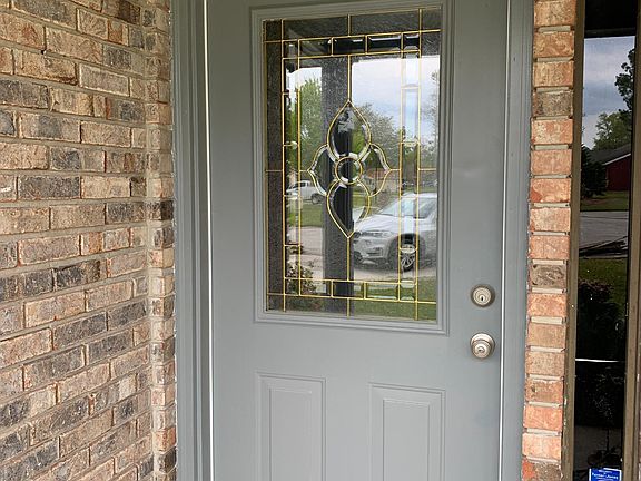 Covered front porch, brick front