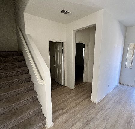 Foyer area with powder room and entry to In-Law suite downstairs