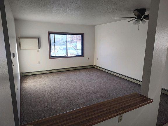 Living room looking through the kitchen pass through