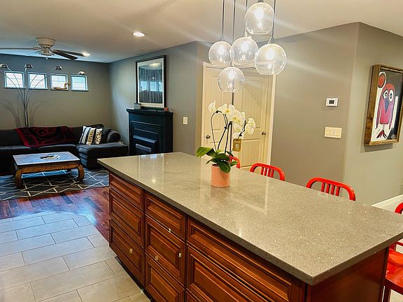 kitchen island with living room in background