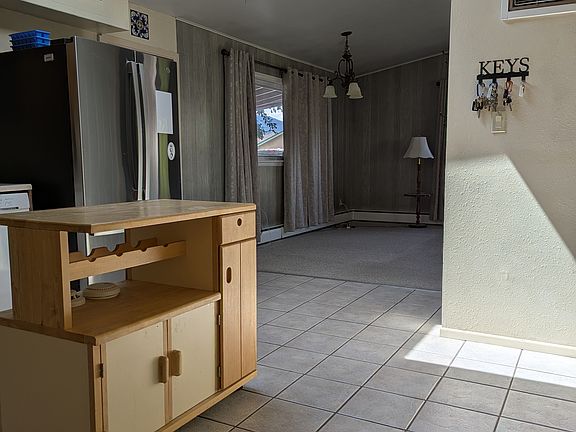 Dining area off of kitchen or can be used as part of the living room.