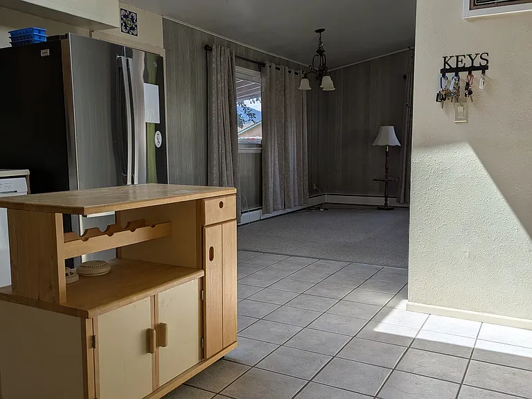 Dining area off of kitchen or can be used as part of the living room.