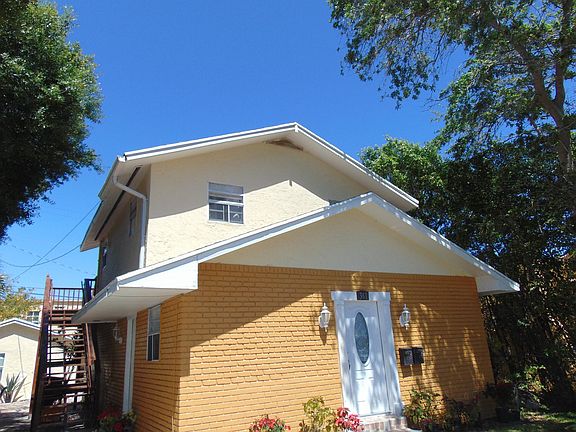 Front of house, apartment is on second floor