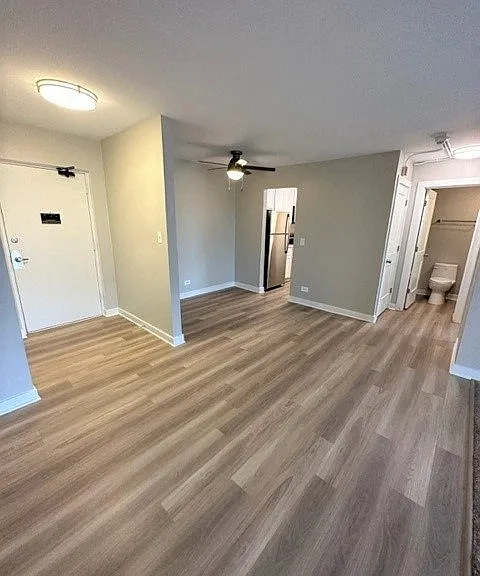Vinyl Wood Flooring Throughout Entry, DIning Room, Kitchen, Hall & Bathroom