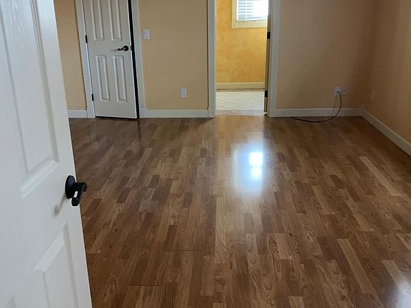 Large master bedroom with walk in closet and separate bathroom