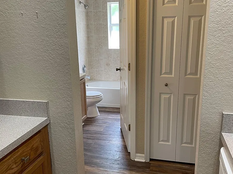 View of 2nd bathroom from kitchen