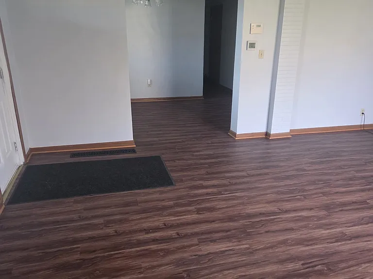 Open Living Room Flowing into Dining Area