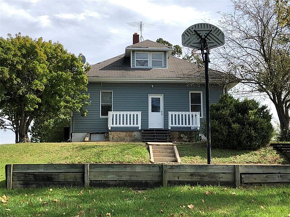 Back porch and also patio where the basket ball hoop is.