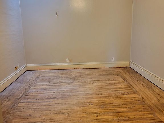 Large living room with hardwood floors