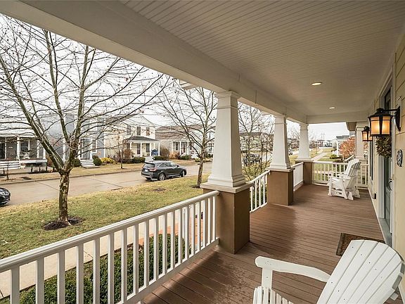Large Covered Front Porch overlooks the common ground.