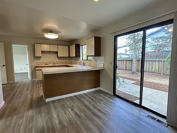 Spacious Kitchen with nook and opens to a level backyard