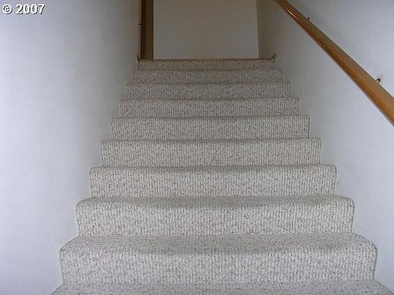 All flooring replaced in 2005. Quality berber on both stairwells.