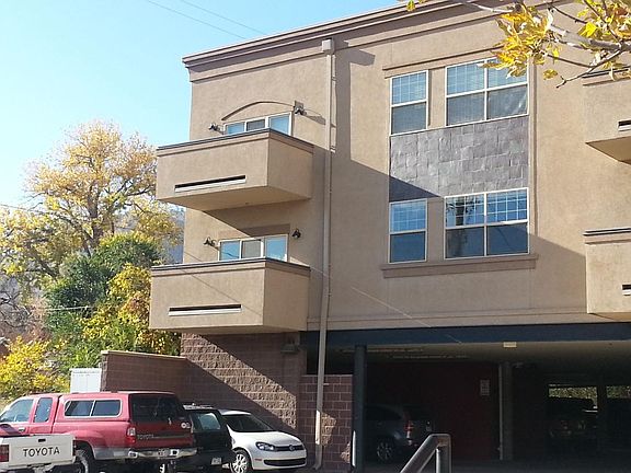 Unit #201 - 2nd floor corner unit with 2 covered parking spo