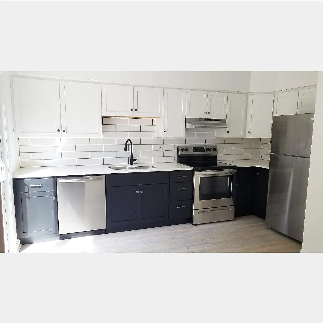 Kitchen with White Quartz Counter tops and Stainless Steel Appliances - 586 Peachview Ln #C