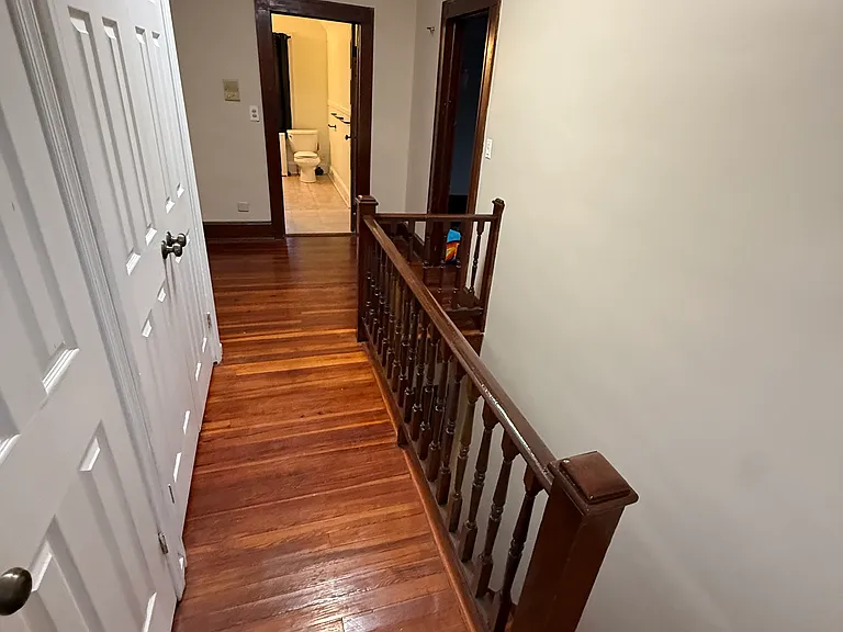 center hall; bedroom on right, kitchen to left