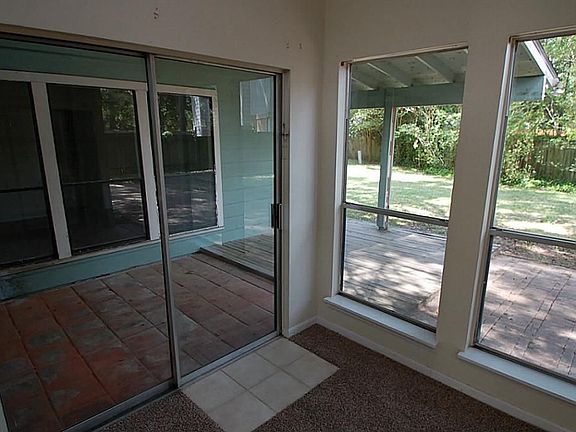 COVERED PATIO OFF THE LIVING ROOM