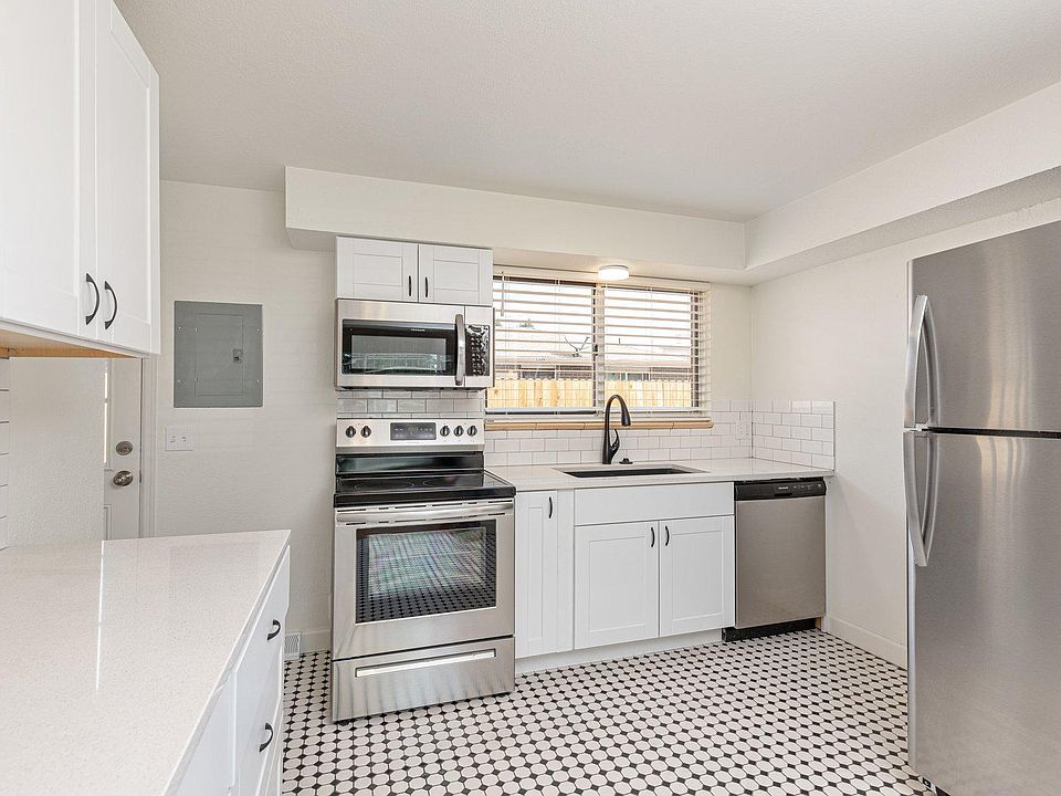 Completely updated kitchen with new cabinets new stainless steel appliances and new quartz countertops