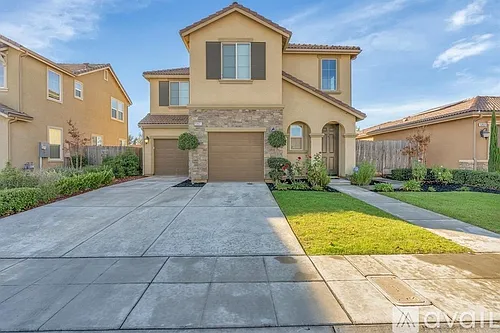 5861 W Parr Ave Photo 1