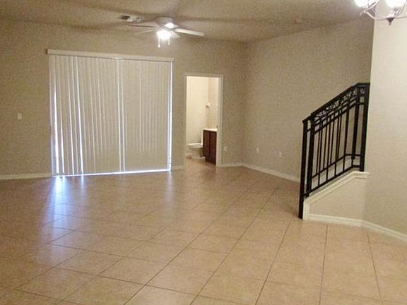 View of half bath and staircase.