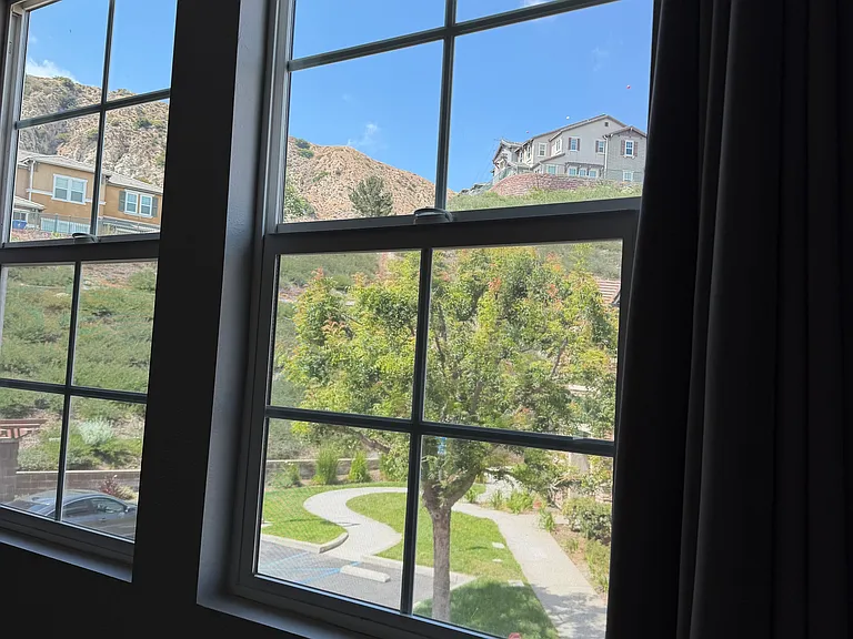 Enjoy scenic mountain views and abundant natural light from the living room.