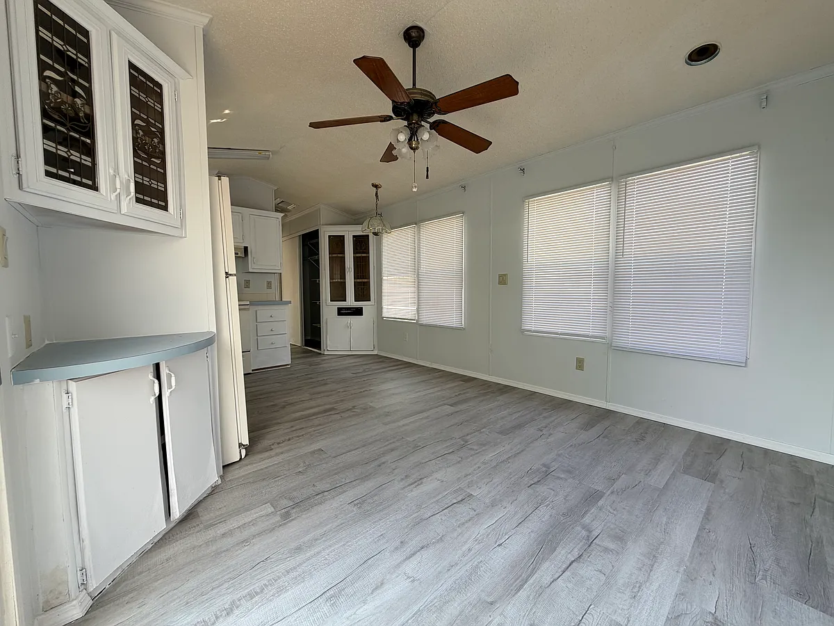 Photo 2 of 12 - 37021 Tucker Rd #22 - Zephyrhills, FL Living room - 37021 Tucker Rd #22