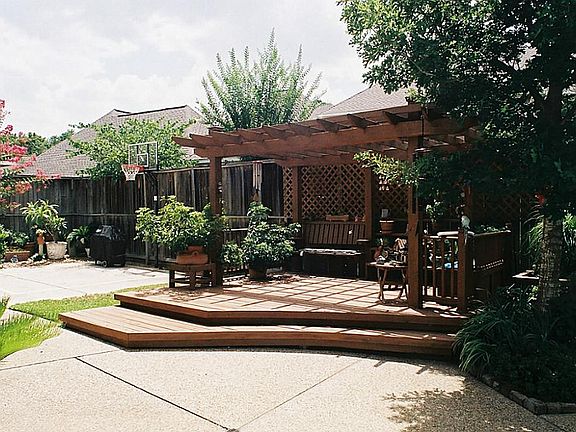 Fantastic raised decking in the rear yard for family relaxation around the pool.