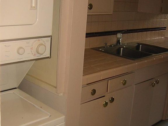 Stack WD next to Kitchen