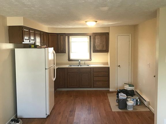New carpet, kitchen floor, fixtures, and range