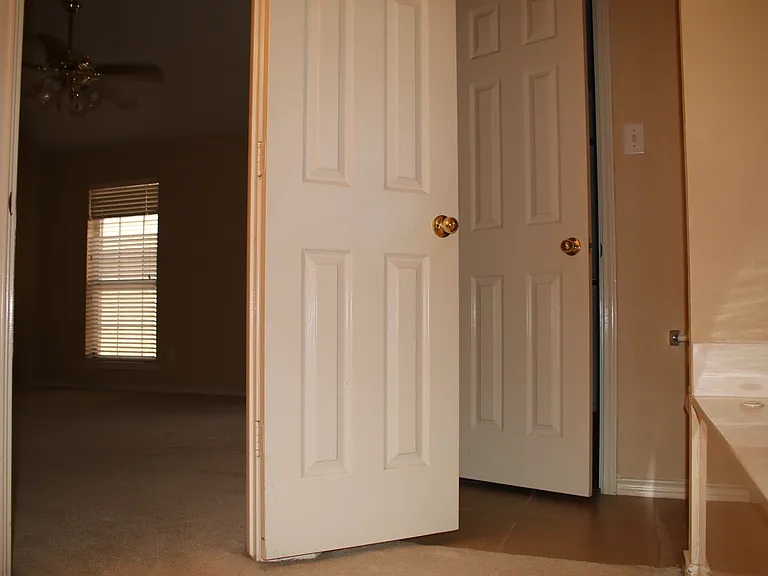 Master 2 bath looking out to room.